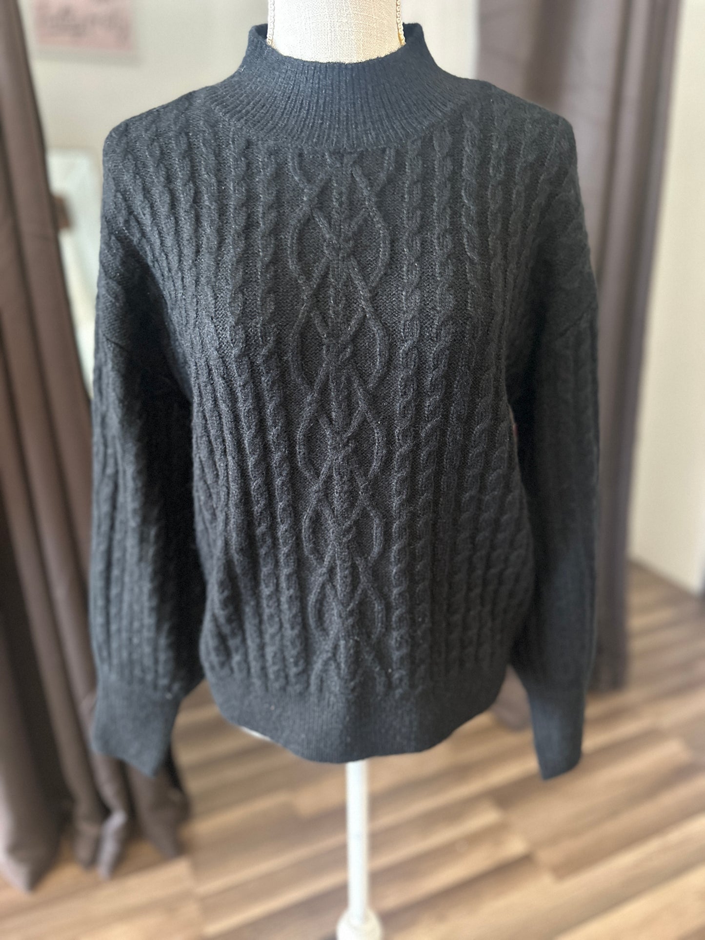 Black cable sweater